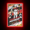 Neon sign reading 'Threat Level Midnight' with a red background and blue accents.