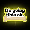 Tibia RGB neon sign in yellow color
