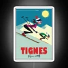 Neon sign with colorful text reading Tignes, a resort in the French Alps.