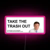 Neon pink sign reading 'Take out the trash' in bold, graffiti-style letters.