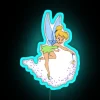 Tinker Bell holding a glowing neon wand in a vibrant blue light