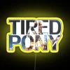 A neon-lit, exhausted pony in a yellow sign.