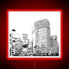 Neon Tokyo skyline with vibrant red and blue hues in Shibuya district.