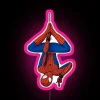 Tom Holland in Spider-Man costume posing with a pink neon sign that reads 'Depend'