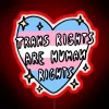 Neon sign reading 'Trans Rights Are Human Rights' in bold, colorful letters.