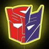 Transformers Autobots vs Decepticons neon sign in vibrant RGB colors, highlighting iconic robot logos.