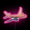 Neon sign with pink and colorful lights at a travel destination