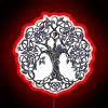 Neon sign featuring a stylized tree of life design in silver, red, and RGB colors.