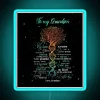 Neon tree with DNA code and grandson's name in sparkling black RGB colors on a blue background.