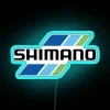 Neon sign featuring Shimano fishing tackle logo in RGB colors.