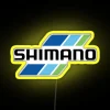 Neon sign with vibrant colors featuring triple Shimano fishing tackle logos.