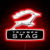 Triumph Stag logo on a neon sign in RGB color scheme.