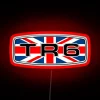 Neon RGB Triumph TR6 badge with a Union flag.