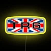 Triumph TR6 badge with Union flag on a neon sign in RGB color scheme