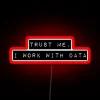 Neon sign reading 'Trust me, I work with data'