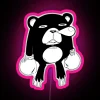 Neon sign with vibrant pink color scheme in a Japanese-inspired setting, reflecting a trendy and lively atmosphere.
