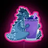 Tsunami-themed neon sign with blueberry smoothie design in pastel pink color