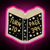 Neon sign with colorful, glowing letters "Turn to Page" in pink and RGB hues.