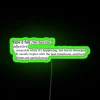 Neon sign with colorful, glowing lettering in a fun, cursive font