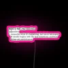 Neon pink sign with fun, bold typeface in a stylized font.