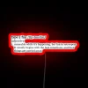 Neon sign with red, glowing type 2 fun logo.