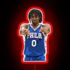 Philadelphia 76ers guard Tyrese Maxey under neon lights