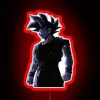 Goku with Ultra Instinct mastered, neon sign reading Migatte no Gokui