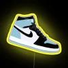 Unc Jordan 1 LED neon sign with yellow illumination on a dark background.