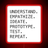Design thinking process illustrated with neon signs, highlighting the stages of understand, empathize, ideate, prototype,...