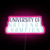 University of National Champions neon sign with pink accents