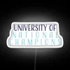 University of National Champions neon sign illuminated in RGB colors on a white background.