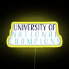 Neon sign reading 'University of National Champions' in bold, colorful letters.