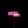 Neon pink sign with bold, cursive font displaying the word 'Unless'