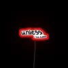 Neon sign with red letters that read 'Unless'