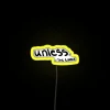 Neon sign with yellow letters displaying the phrase 'Unless'