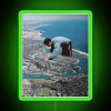 Neon-lit cityscape with vibrant green glow