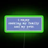 Neon sign with the phrase 'Use Commas' in bold green letters on a dark background.