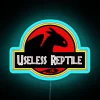 Glowing neon sign featuring a colorful reptile design