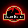 Neon-lit reptile sign with bold, colorful graphics.