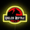 A colorful neon sign featuring an irrelevant reptile design