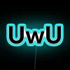 Neon sign with colorful, pixelated letters displaying a cute 'uwu' face in blue hues.