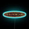 Neon V8 Supercars sign in blue light display