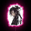 A neon-lit sign featuring Vagabond's Musashi Miyamoto in pink hues.