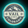 Neon sign in Vail, Colorado with a blue color scheme.