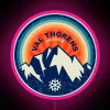 Neon sign reflecting off snow in Val Thorens ski area, France