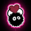 Neon pink Valentine's Day decoration with a soot sprite design.