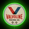 Neon sign with Valvoline Racing logo in green.