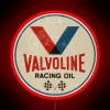 Neon sign with Valvoline Racing logo in red color scheme.