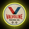 Neon Valvoline Racing Sign with Bright Yellow Background