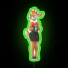 Neon sign with green glow in a vanity or solo setting.